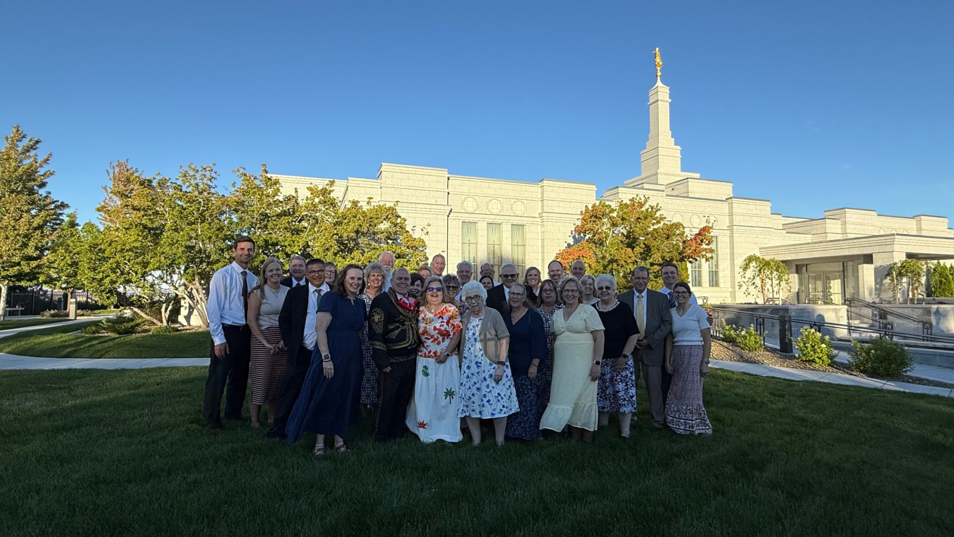 Ward members gathered on the temple grounds